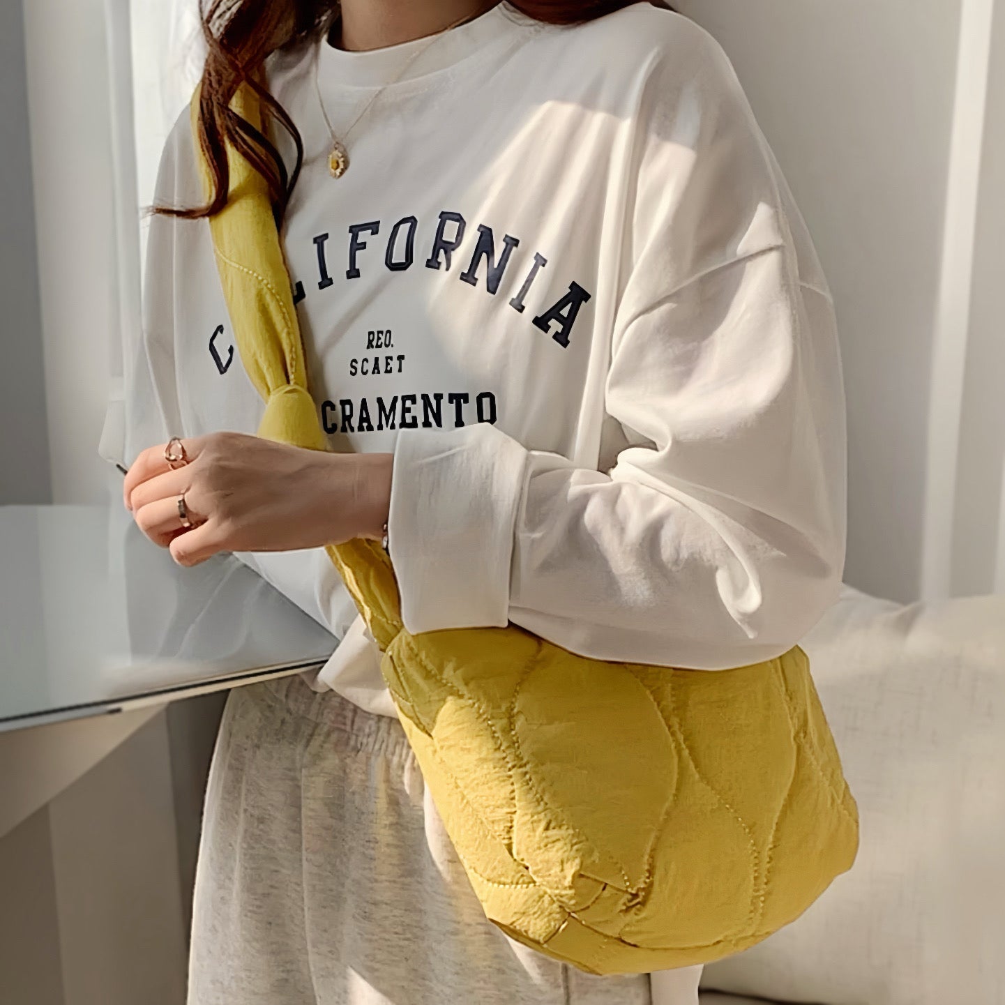 Crescent Quilted Crossbody Bag